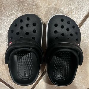 Toddler size 5 black crocs.